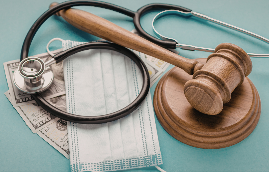 Attorneys reviewing legal documents with gavel and scales of justice