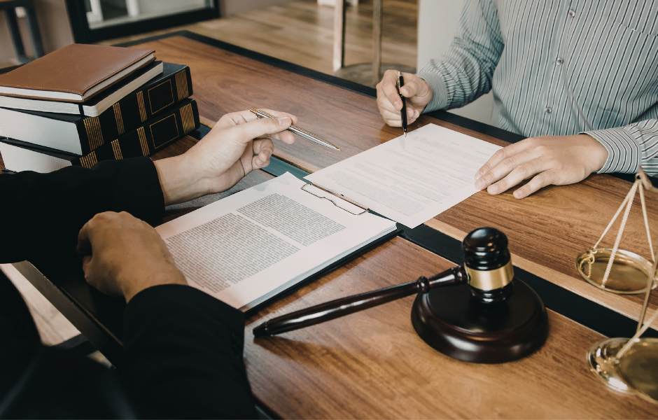 Doctor reviewing medical documents with patient during consultation