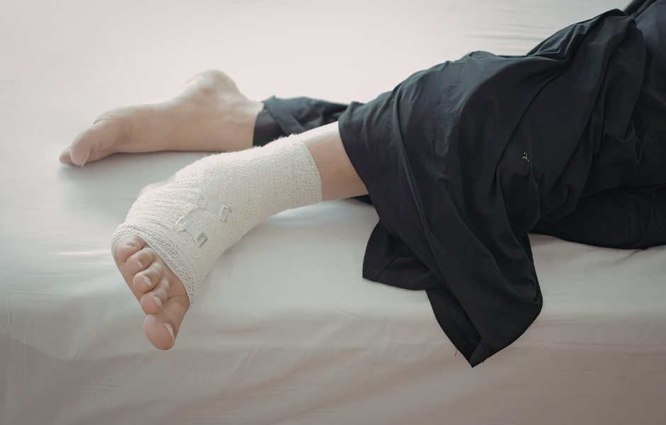 Person wearing arm sling representing ongoing injury recovery during case timeline