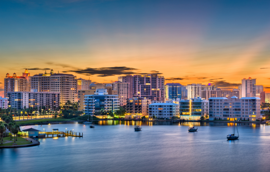 Attorney reviewing case documents at desk with scales of justice